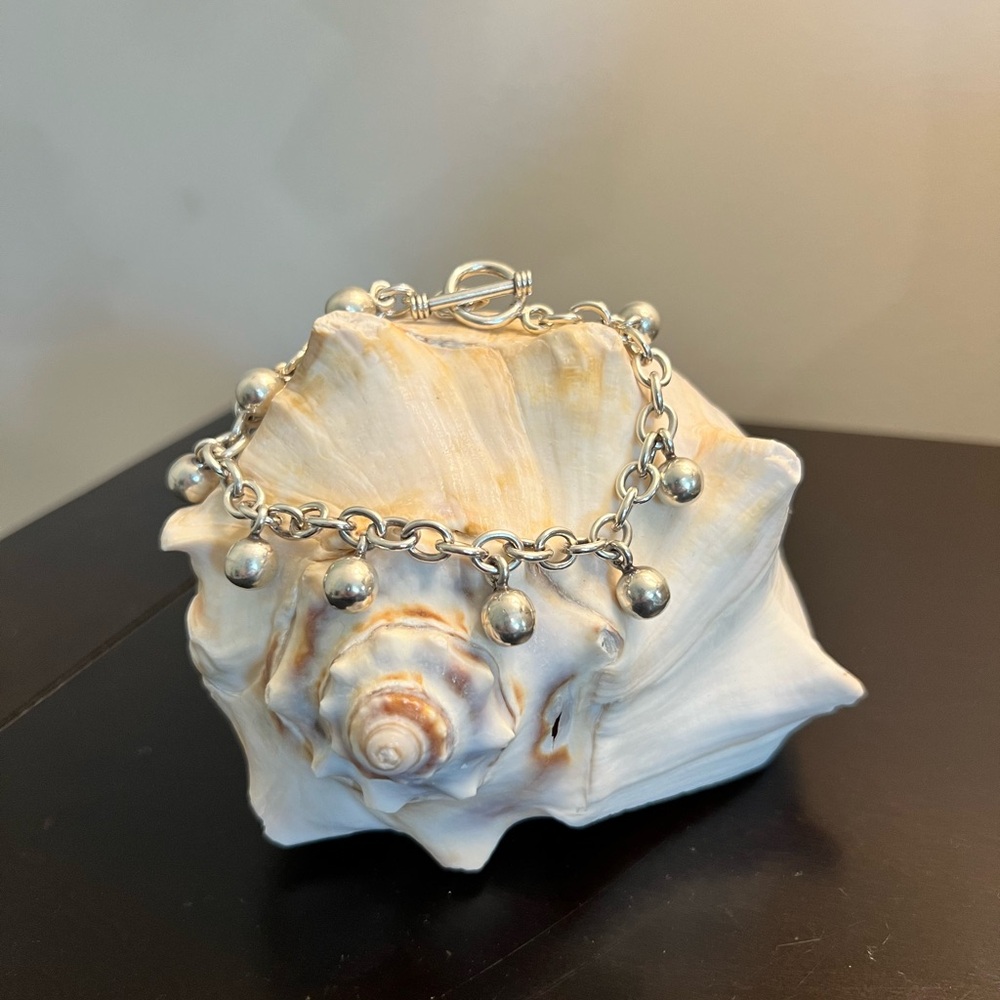 Sterling silver beaded chain bracelet.